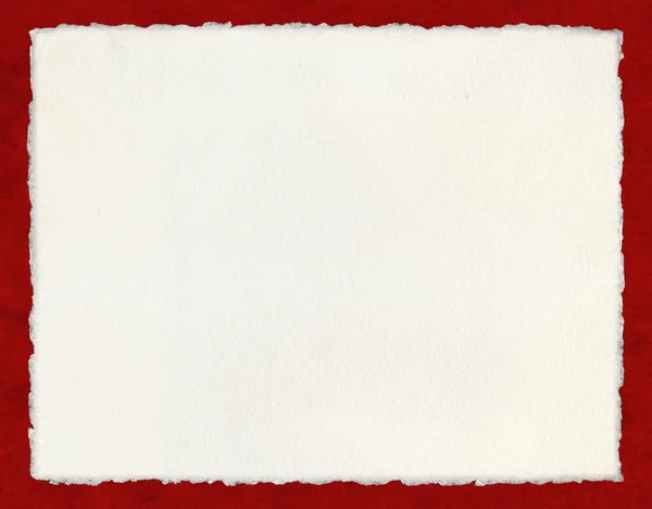 Deckled papper på röd — Stockfoto