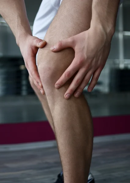 Біль у коліні — стокове фото
