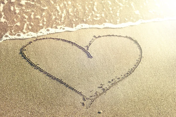 Heart in the sand beach Stock Picture