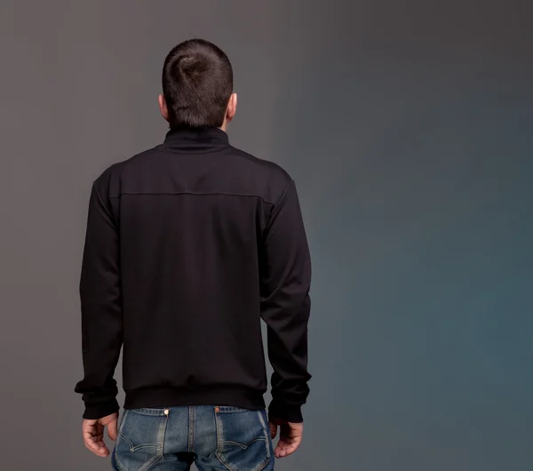 Back view.Male person in black — Stock Photo, Image