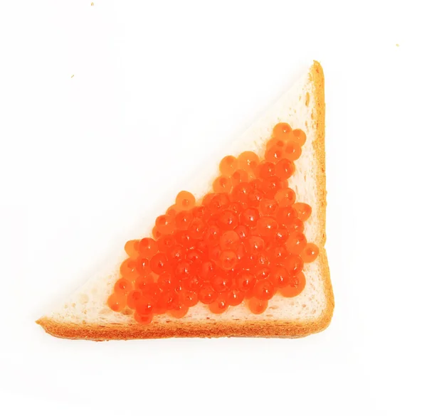 Sanduíche triangular com manteiga e caviar vermelho vista superior — Fotografia de Stock