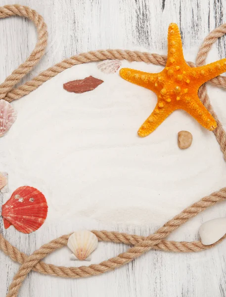 Fondo náutico con cuerdas, conchas y estrellas de mar — Foto de Stock