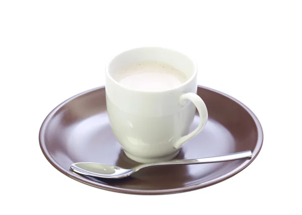 Šálek s kávou na hnědé talíře Royalty Free Stock Fotografie