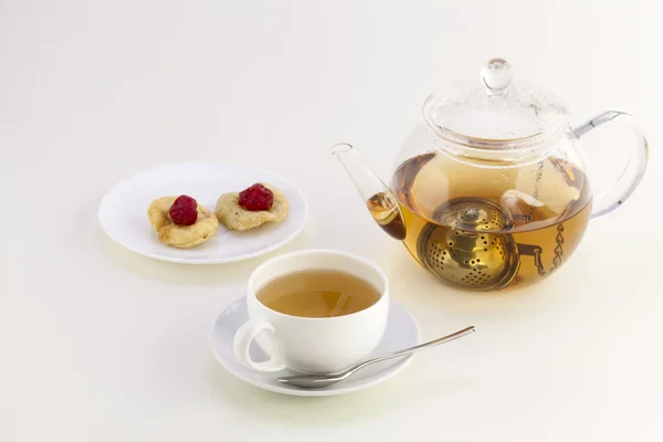 Filiżankę herbaty, owoców kandyzowanych i czajnik — Zdjęcie stockowe