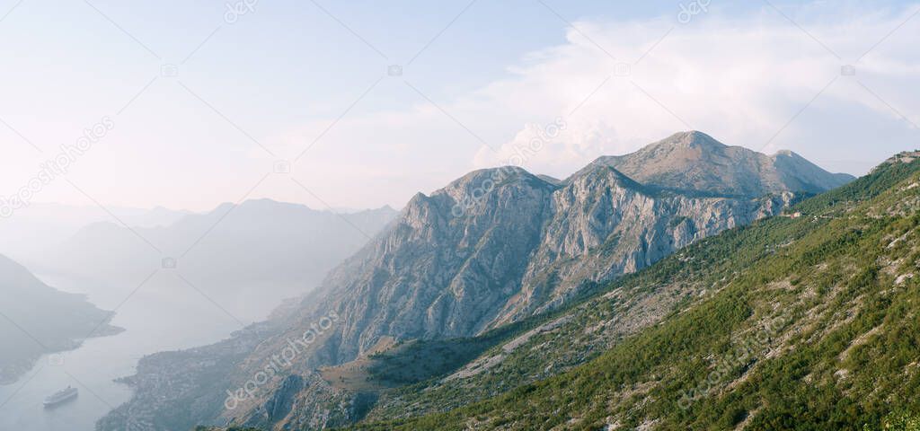 View from Mount Lovcen to Kotor Bay in fog. Montenegro