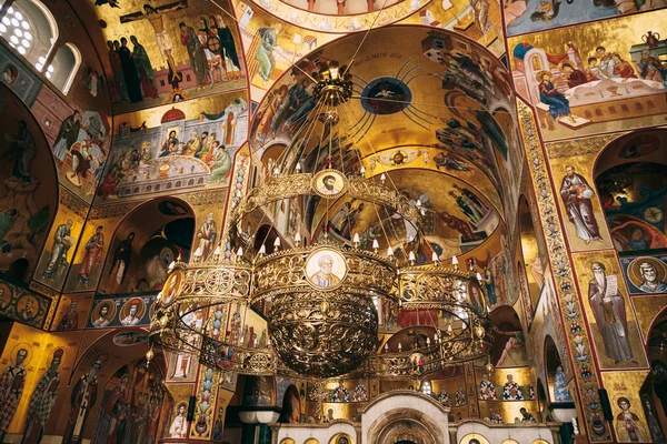 Chandelier hangs from the ceiling inside the Cathedral of the Resurrection of Christ in Podgorica — Stockfoto