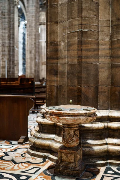 Stone bowl on a pedestal with a lid in the Duomo. Milan, Italy — стокове фото