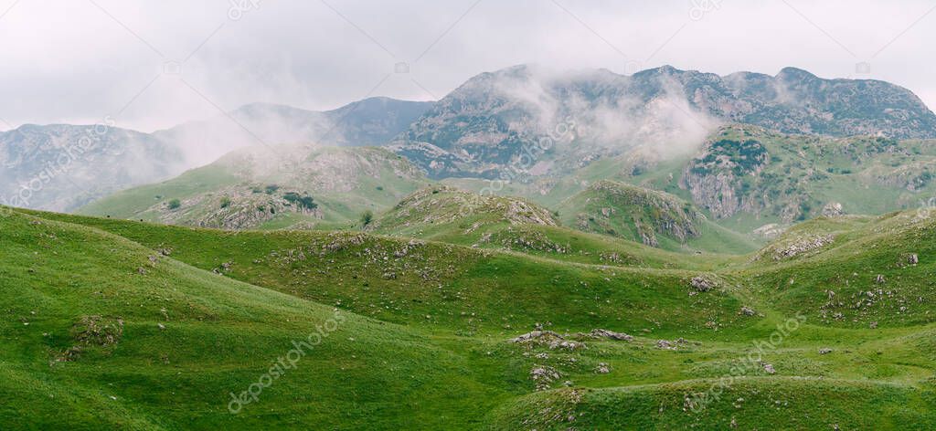Mist descends from the mountains in Durmitor National Park. Montenegro