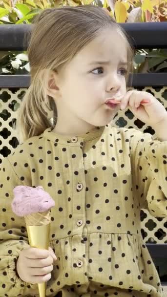 Little Girl Licks Spoon Ice Cream High Quality Footage — Wideo stockowe