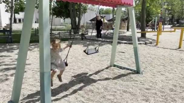 Little Girl Swings Swing Playground High Quality Footage — Wideo stockowe