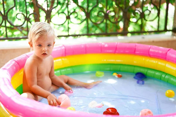 Little Girl Sits Inflatable Pool Balcony High Quality Photo — Stock Photo, Image