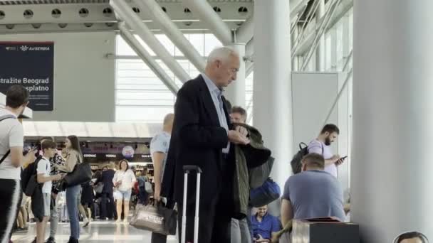 Man Checking Ticket While Waiting Departure Airport Terminal High Quality — Vídeos de Stock