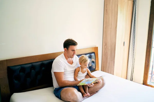 Dad Reads Book Little Girl Bed High Quality Photo —  Fotos de Stock