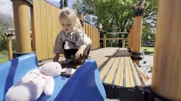 Little Girl Slides Slide Soft Toy Playground High Quality Footage — Vídeo de Stock