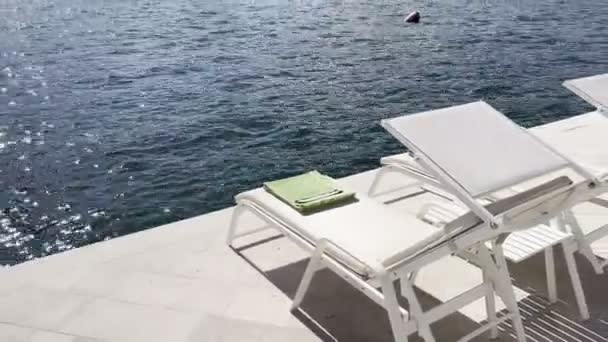 Sun Loungers Stand Banks Perast Water High Quality Footage — Videoclip de stoc