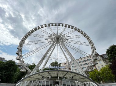 White ferris wheel in a park in Budapest. Hungary. High quality photo
