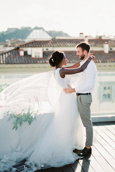 Groom Hugs Bride Dress Plume Terrace Building High Quality Photo Obrazek Stockowy