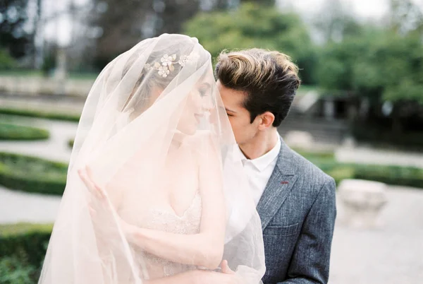 Groom Hugs Almost Kisses Bride Her Park High Quality Photo — Stok Foto