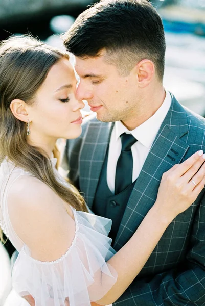 Bride Put Her Hand Shoulder Groom Hugging Her Close High — стоковое фото