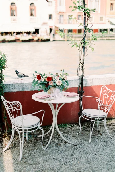 Laid Table Bouquet Flowers Chairs Stone Fence High Quality Photo — Fotografia de Stock