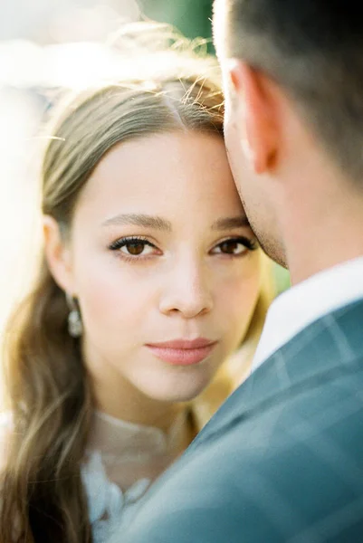 Groom Kisses Bride Forehead Portrait High Quality Photo — стоковое фото