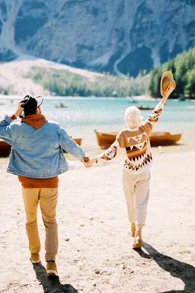 Man Woman Hats Walk Lake Braies Italy Back View High Stok Foto Bebas Royalti