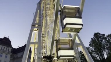 Luminous booths in a large Ferris wheel. Budapest, Hungary. High quality FullHD footage