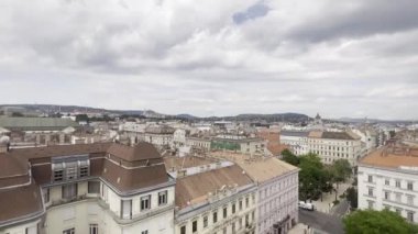 View from the cockpit of the Ferris wheel to the old houses. Budapest. High quality 4k footage