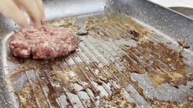 Meat cutlet is fried in a pan. Close-up. High quality 4k footage