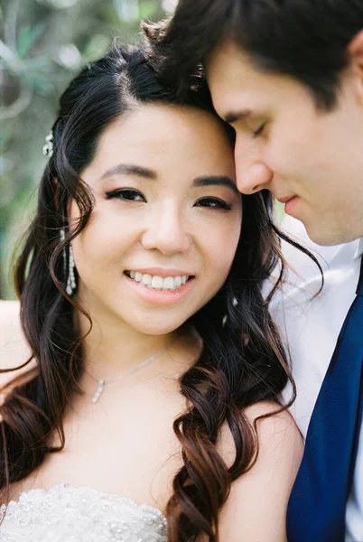 Groom Hugs Smiling Bride Portrait High Quality Photo — Foto Stock