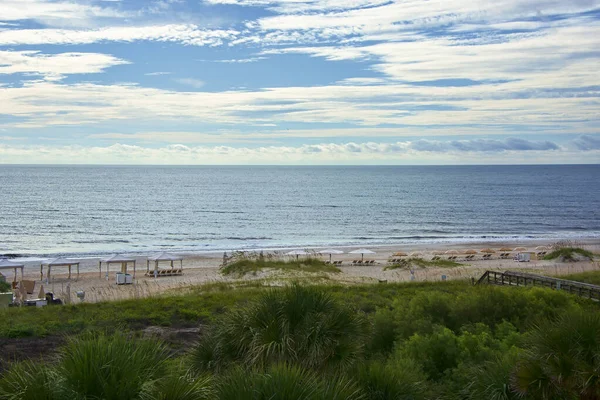 Sunny day on Amelia Island Beach, an island in Nassau County, Florida.