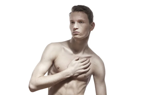 Здоровый мускулистый молодой человек. Изолированный на белом фоне Стоковое Изображение
