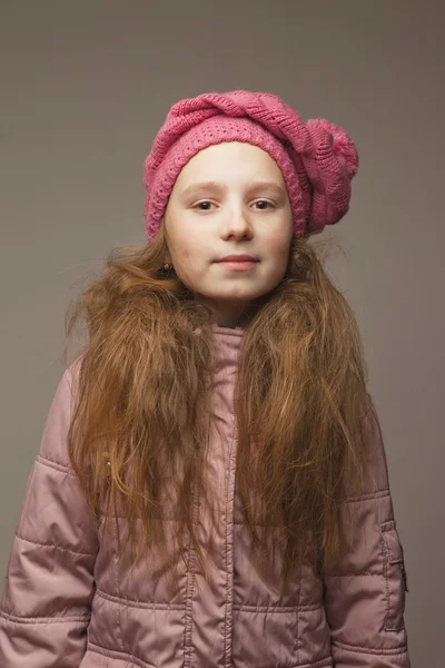 Menina bonito em chapéu rosa Fotos De Bancos De Imagens