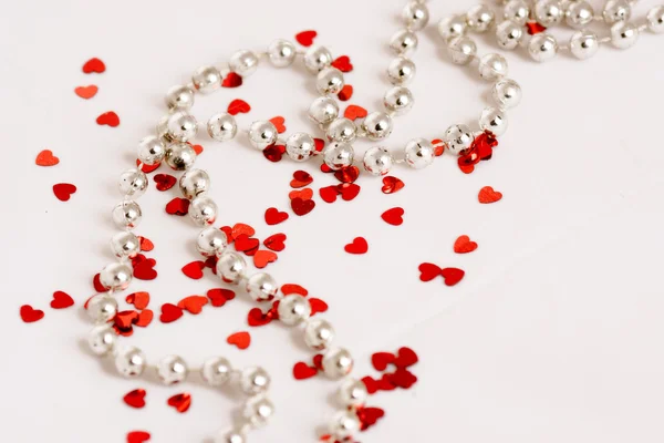 Glitter hearts and pearls — Stock Photo, Image