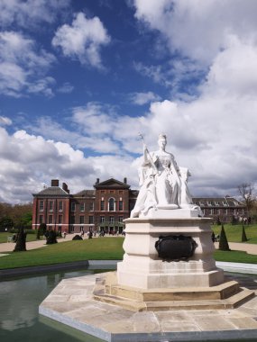 Statue of Queen Victoria in front of Kensington Palace, London clipart