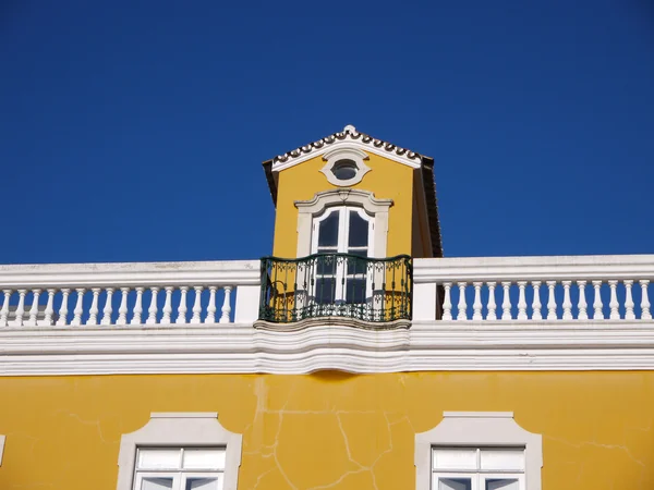 Rooftop window on typical Portuguese building — Stock Photo, Image