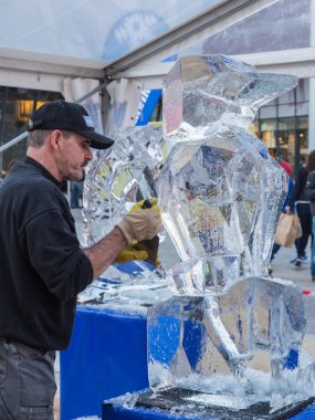 Ice sculpting at Sculpture Festival clipart