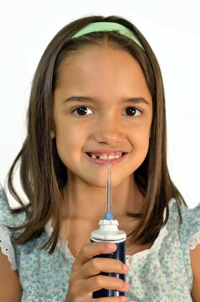 Hispanic meisje met water floss — Stockfoto