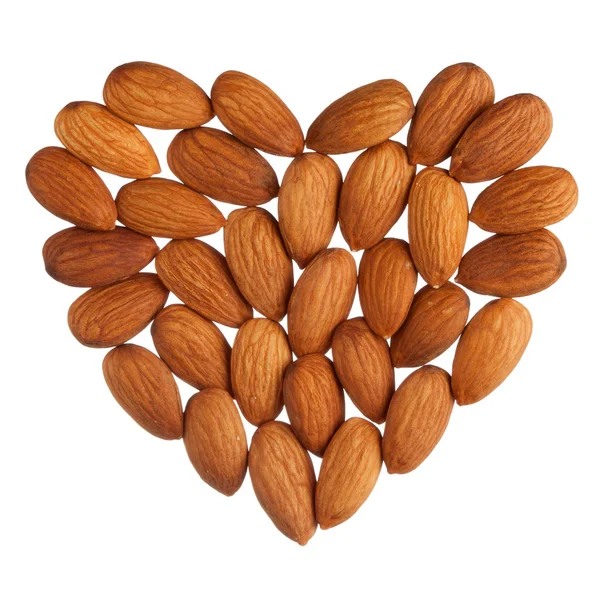 Almond heart isolated on white background — Stock Photo, Image