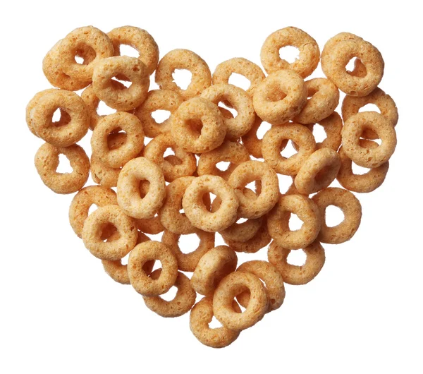 Cheerios cereal in a heart shape isolated on white background — Stock Photo, Image
