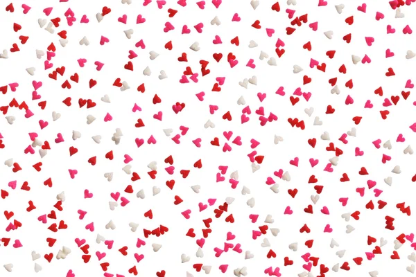 Background of heart sprinkles in red, pink and white — Stock Photo, Image