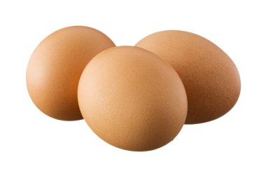 Beyaz arka plan üzerinde izole kahverengi üç yumurta