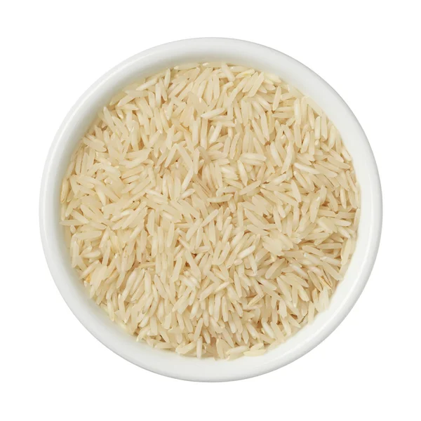 Arroz basmati em uma tigela isolada em fundo branco — Fotografia de Stock