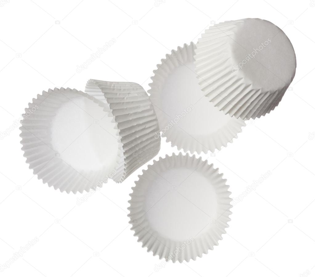 Paper muffin cups isolated on white background