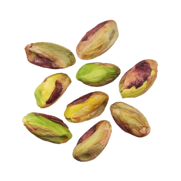 Pistachios nuts without shells isolated on white background, clo — Stock Photo, Image