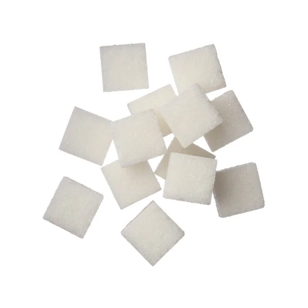 Cubes de sucre sur fond blanc, gros plan — Photo