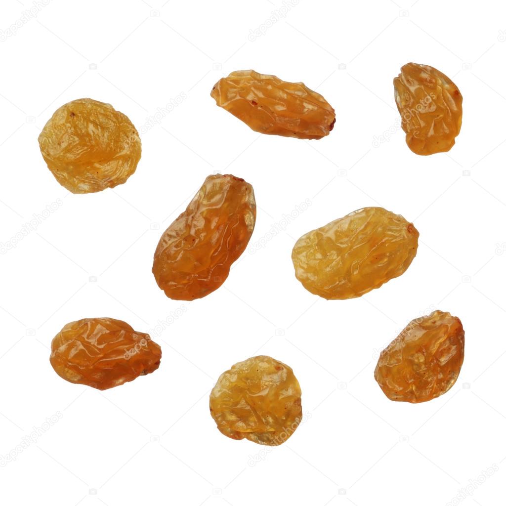 Dried golden raisins isolated on white background, close up