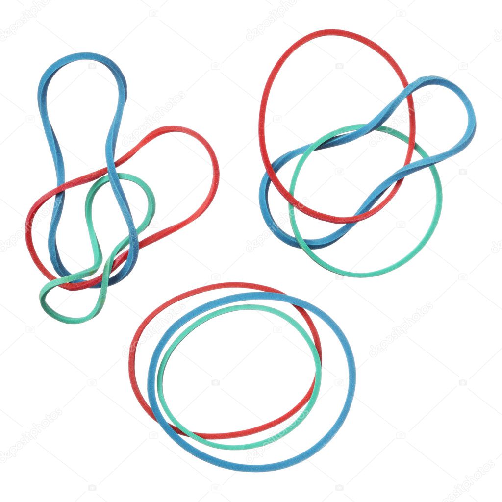 Red, green and blue elastic rubber bands isolated on white