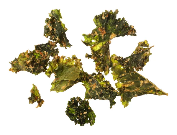 Roasted kale chips isolated on white background — Stock Photo, Image