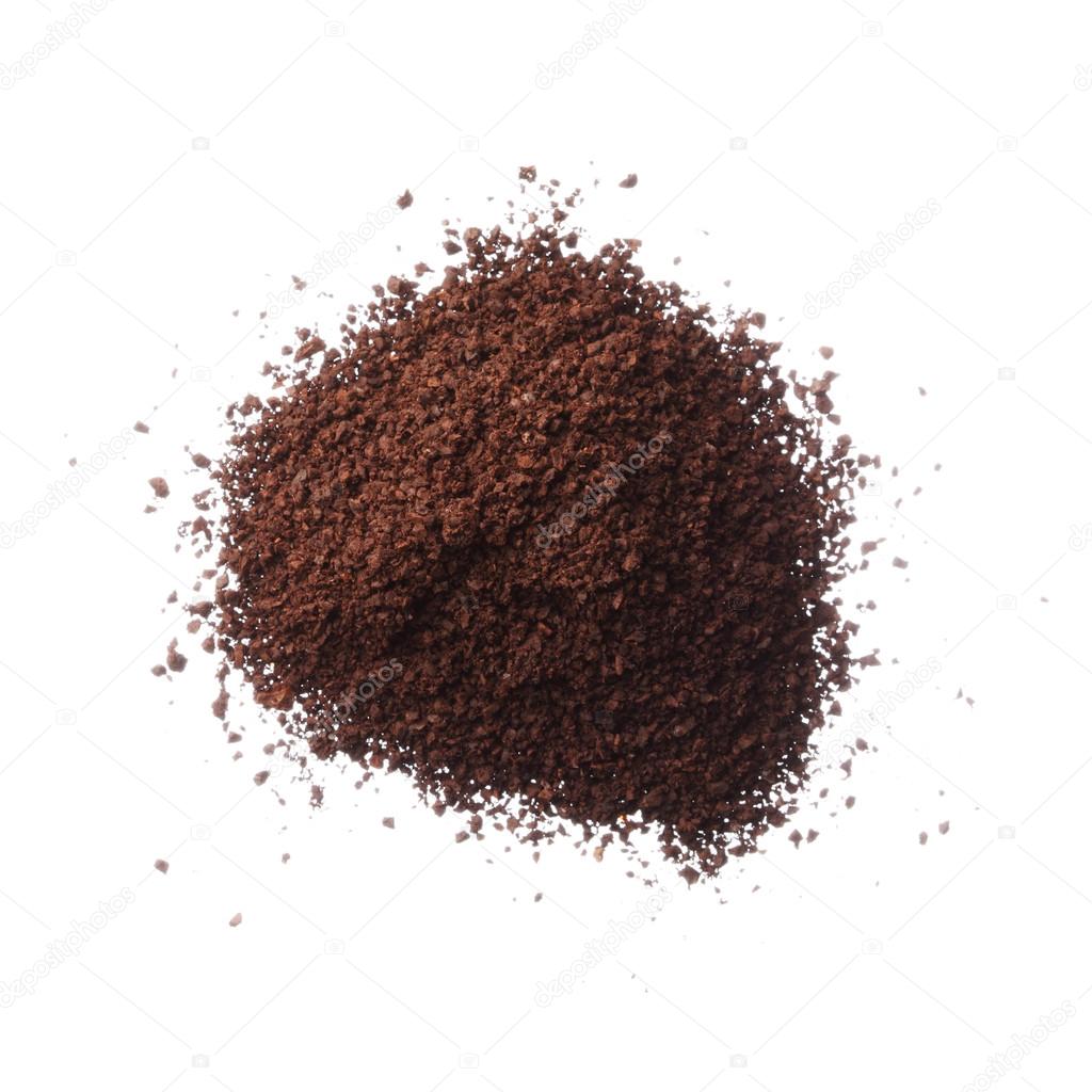 Ground coffee pile isolated on white background overhead view